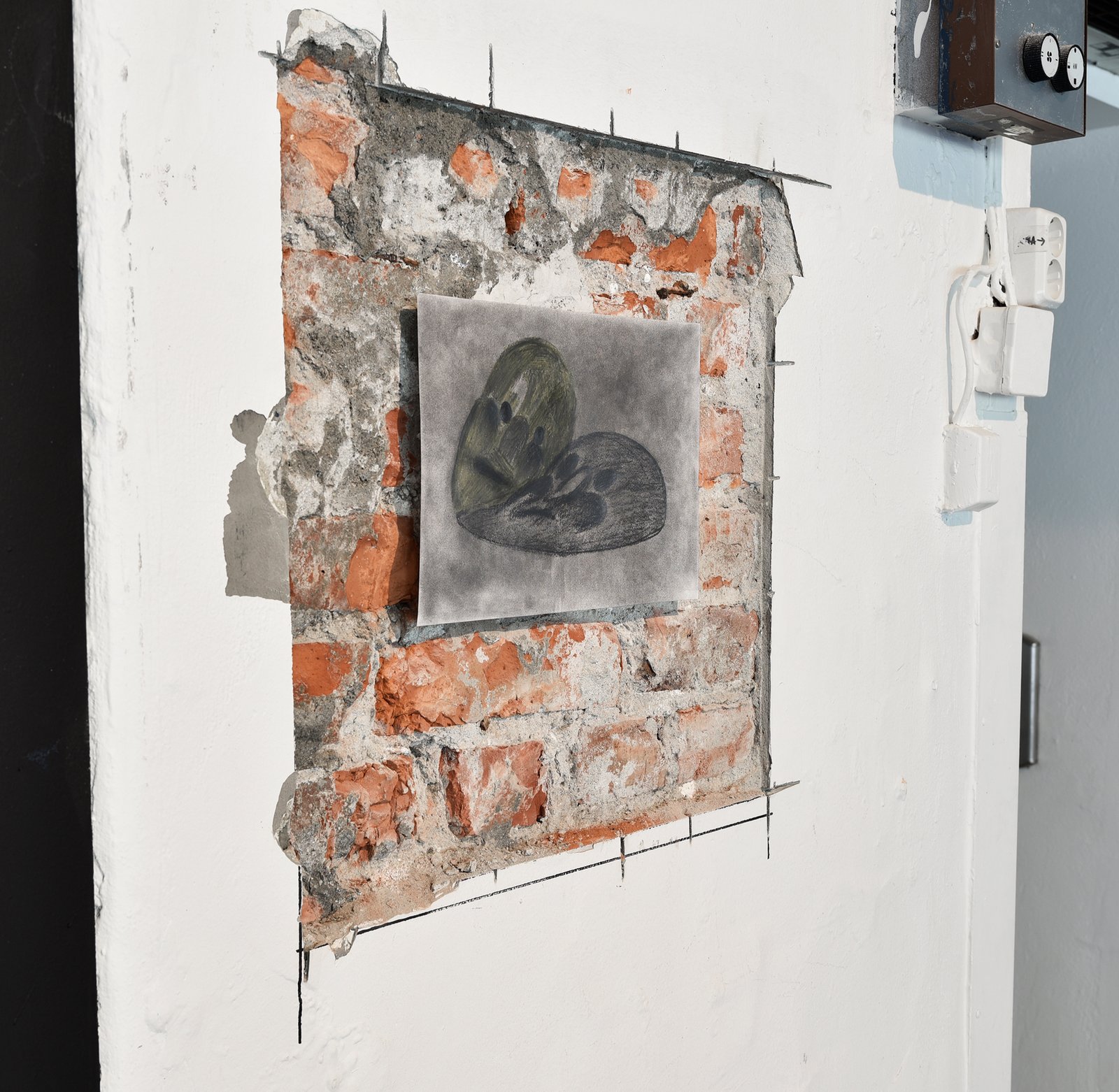 Graphite drawing on brick wall by Anna Clawson